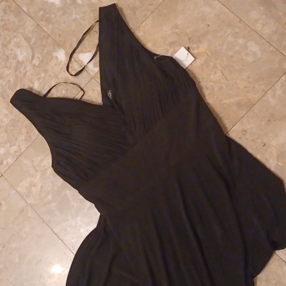 NWT...Classy V neck front and back black dress. Size:4